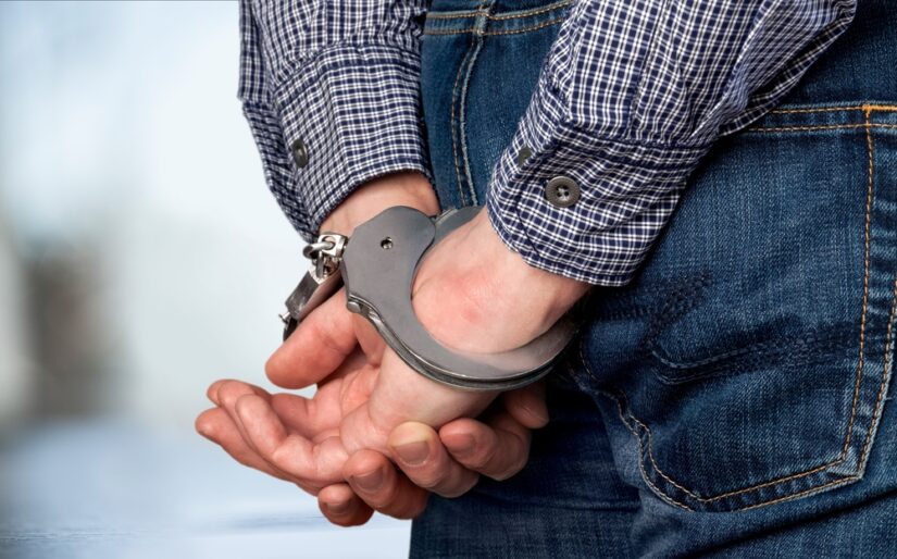 Photo of Man in Handcuffs
