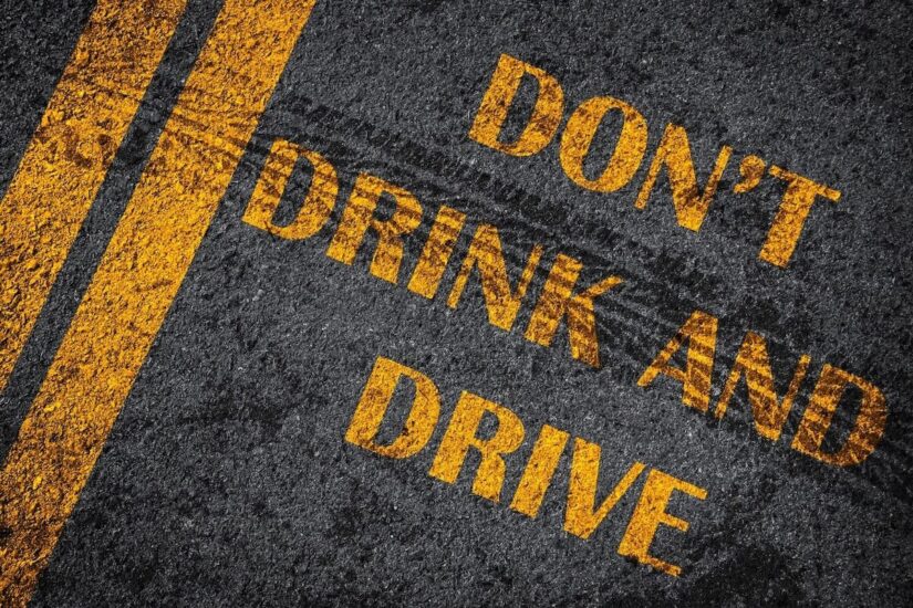 Don't drink and drive written on the road