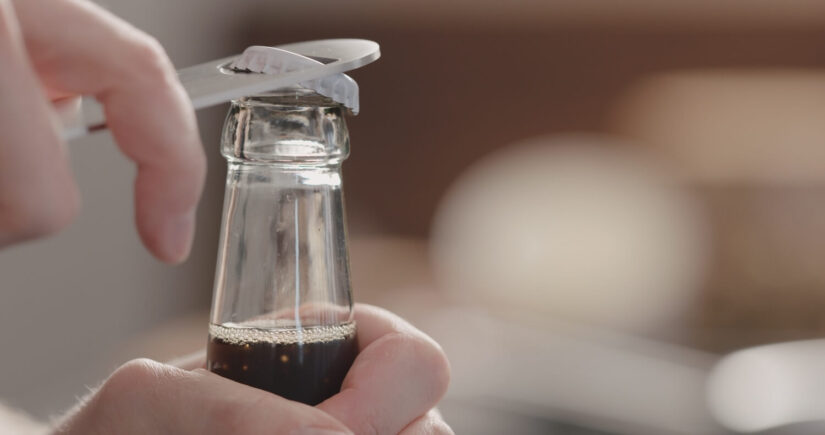 Man opening glass jar