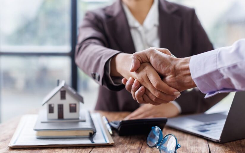 Lawyer shaking hands with a client Lawyer shaking hands with a client