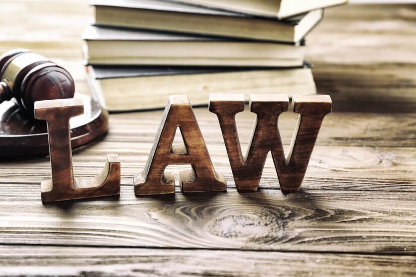Law books Legal books on a wooden background