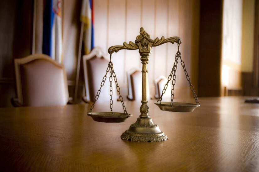 Photo of law scales in courtroom